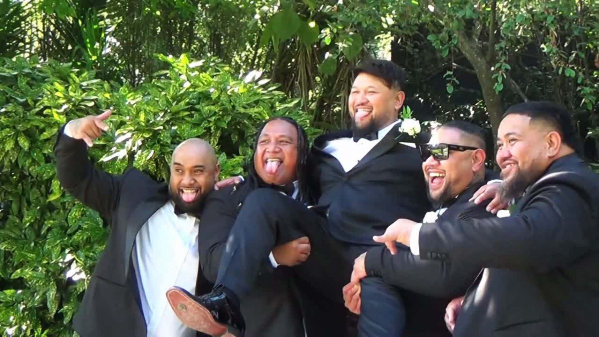 A joyful group of groomsmen